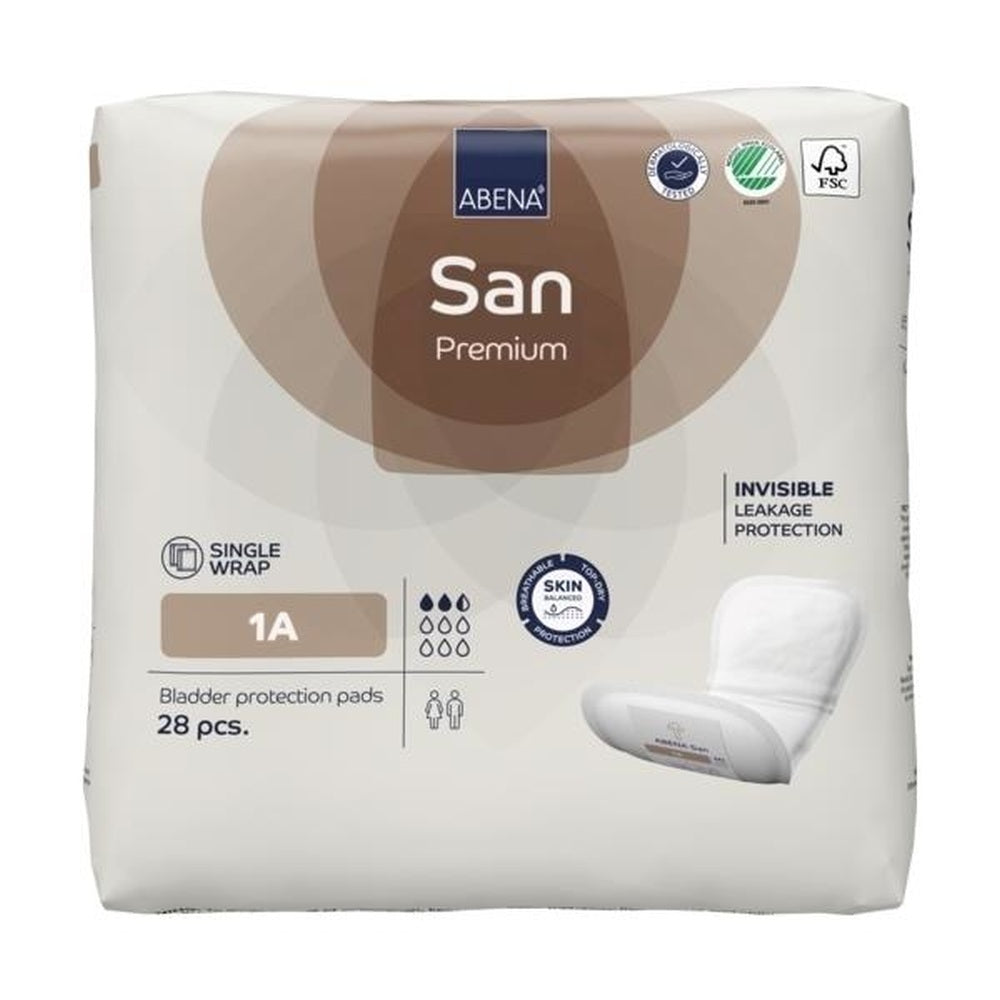 Auf dem Bild sind mehrere anatomisch geformte Einlagen der Marke Abena zu sehen. Die Einlagen sind meist weiß und haben eine bequeme, saugfähige Oberfläche. Sie sind leicht gebogen und zeigen eine strukturierte Oberfläche, die für zusätzlichen Komfort sorgt. Die Verpackung der Einlagen ist teils transparent, sodass die Produkte zum Teil sichtbar sind. Im Hintergrund sind sanfte, neutrale Farben zu erkennen, die zu einem gepflegten Gesamtbild beitragen.