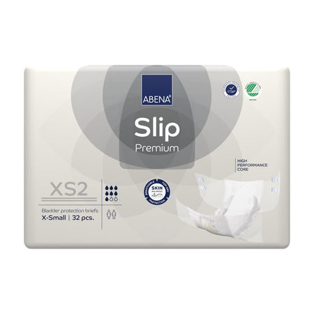 Abena Slip Premium XS2 in einer packungs- und produktorientierten Darstellung. Das Bild zeigt die Windel in einer weißen und blauen Farbgestaltung, mit einer leicht glänzenden Oberfläche und mehreren detaillierten Grafiken, die die wichtigsten Eigenschaften hervorheben. Die Windel ist geöffnet und liegt flach auf einem neutralen Hintergrund, um ihre Form und Struktur zu verdeutlichen. Die abgebildete Größe ist für sehr kleine Körpergrößen geeignet.