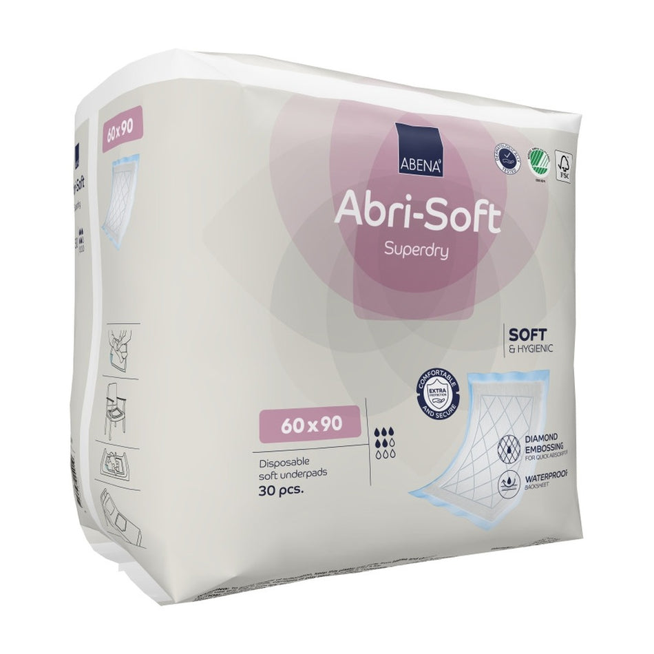 Alt-Text: Abena Abri-Soft Superdry Einwegauflage in der Größe 60 x 90 cm. Das Produkt ist auf einem weißen Hintergrund angeordnet und zeigt eine flauschige, saugfähige Oberfläche sowie eine spezielle effiziente Barriere gegen Nässe. Die Packung ist in sanften, hellen Farben gehalten und hebt das Markenzeichen "Abena" hervor, das in der oberen linken Ecke sichtbar ist. Ideal für den Einsatz im Pflegebereich oder zur hygienischen Abdeckung von Oberflächen.