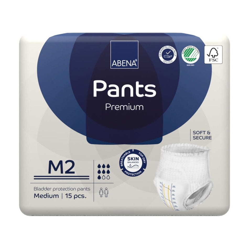 Abena Premium Pants in Größe M2, verpackt in einer blauen Schachtel mit klarer Produktabbildung. Die Hose ist in einem hellen, neutralen Farbton gehalten und zeigt auf der Vorderseite eine elegante Passform mit elastischen Bündchen. Der Herstellername "Abena" sowie spezifische Produktmerkmale sind auf der Verpackung sichtbar. Im Hintergrund ist eine sanfte, einfarbige Oberfläche zu erkennen, die die Produktelemente hervorhebt.