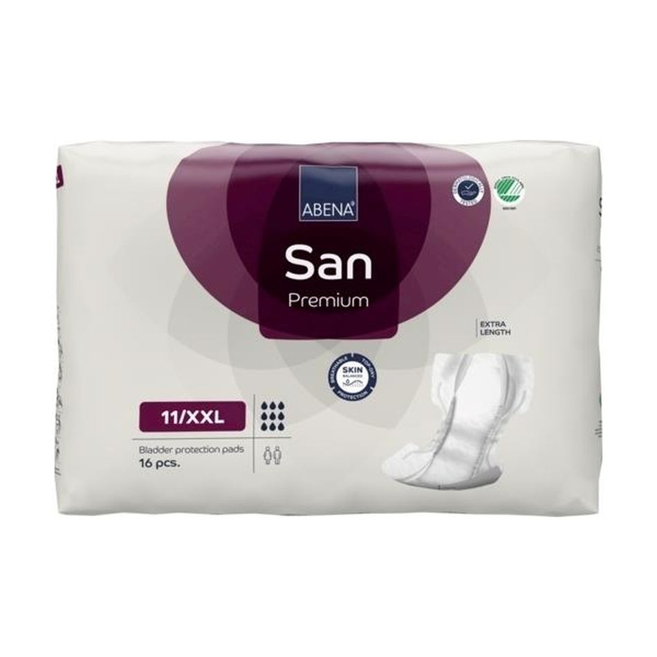 Ein Paket Abena San Premium Gr. 11 XXL Einlagen liegt auf einem hellen Untergrund. Die Vorderseite der Verpackung zeigt Farbdetails in Blau und Weiß mit dem Produktnamen "Abena San Premium" und der Größe "Gr. 11 XXL" gut sichtbar. Die Unten angegebenen Eigenschaften der Einlagen sind in leicht lesbarer Schrift hervorgehoben. Im Hintergrund scheint sanftes Licht, das die Verpackung hervorhebt.