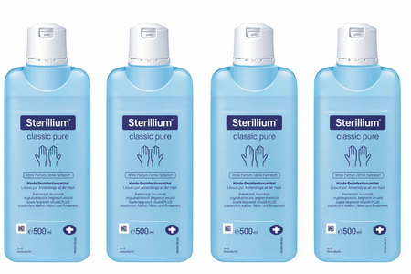Vier Sterillium classic pure 500 ml Flaschen im neuen Design, nebeneinander auf weißem Hintergrund angeordnet.