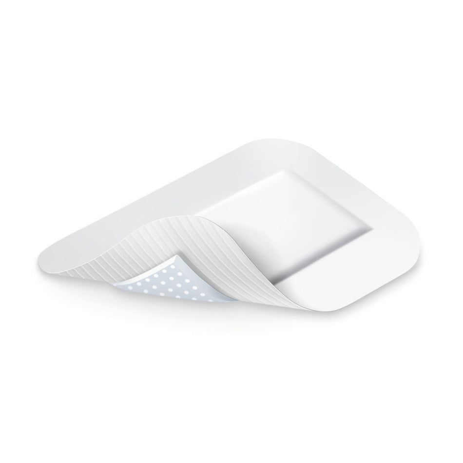 Cosmopor Advance Wundverband 7,2 × 5 cm aufgefaltet – Detailansicht der mehrschichtigen Struktur.