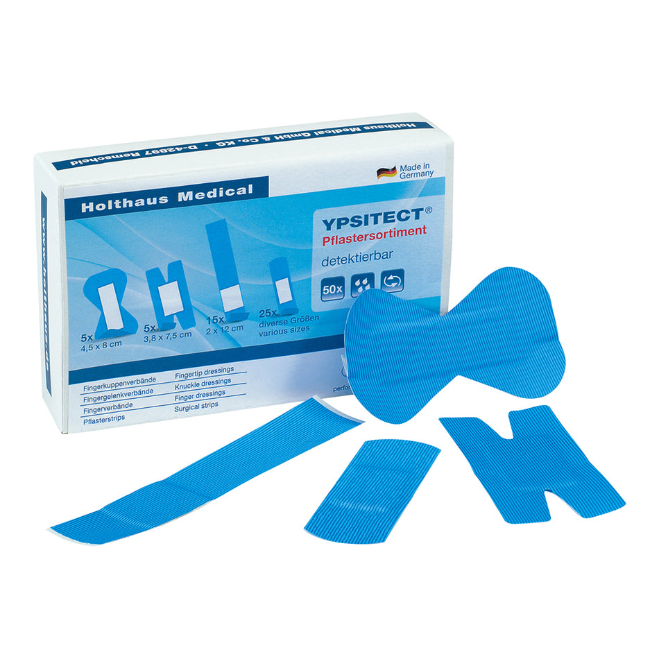 Verpackung des Holthaus YPSITECT PFlastersortiments. Vor der Verpackung iegen vier blaue Pflaster des Sortiments.