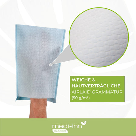 Nahaufnahme der Airlaid-Oberfläche mit Beschriftung „Weiche & hautverträgliche Airlaid Grammatur (50 g/m²)“.
